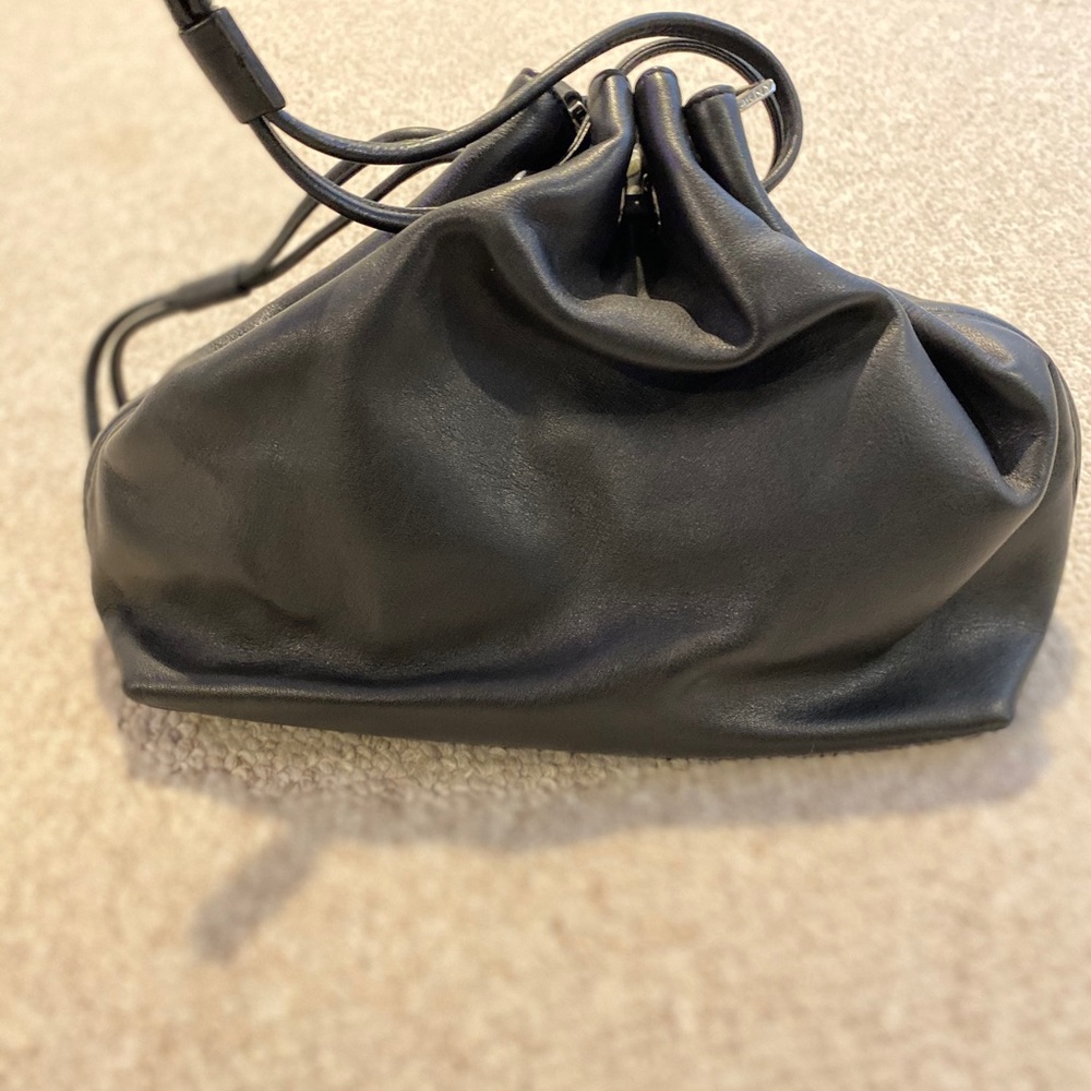 DKNY leather cinch bag with shoulder strap